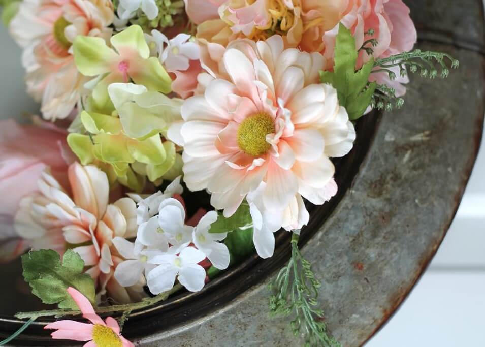 Tyre upcycled into floral wreath